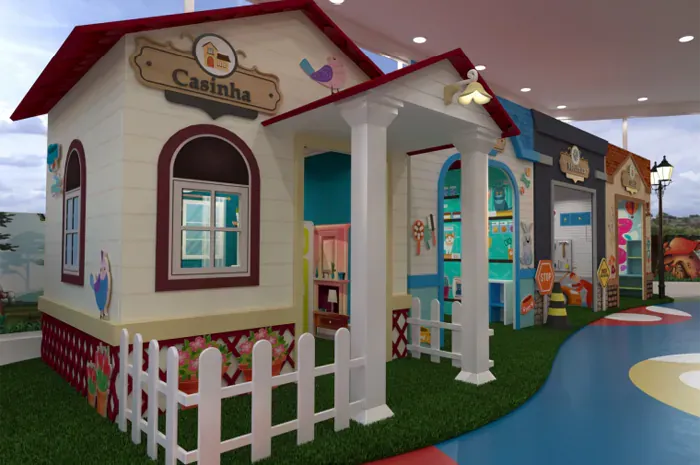 Projeto de mini cidade infantil com casinha de varanda e cerquinha, fachadas temáticas e pista lúdica colorida